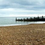 70 – Blue sky. Empty beach. Low tide. episode logo